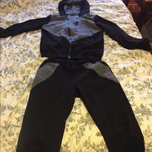 Black and gray sweatsuit. Fitted jogger pants.