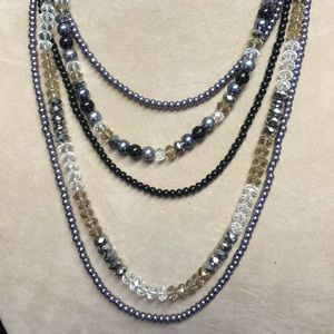 Gold, black, brown, grey layered necklace