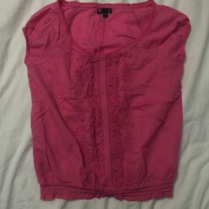A pink lace short sleeved shirt