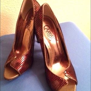 Pounce Peep Toe Pumps