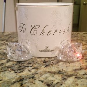 Two Swarovski Crystal swans.