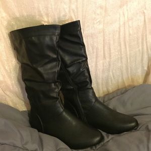 Black boots with leather texture