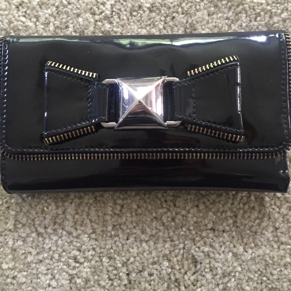 Black Betsey Johnson wallet.