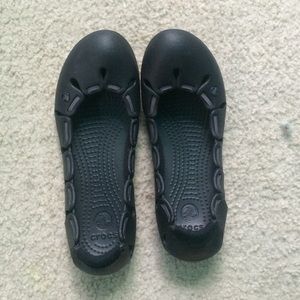 Black crocs flats