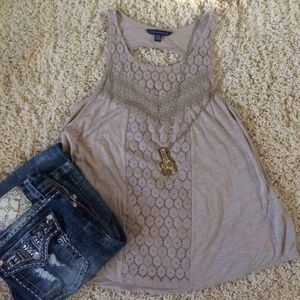 Flowy top with cutout in back and details on front