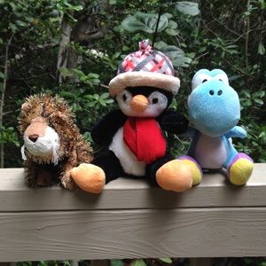 Blue yoshi, penguin, and a webkinz leopard.