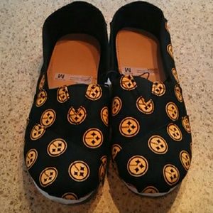 Steelers slip on shoes. NFL collection