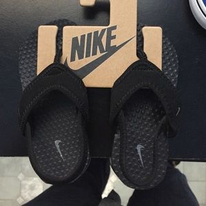 Nike sandals. Never worn.