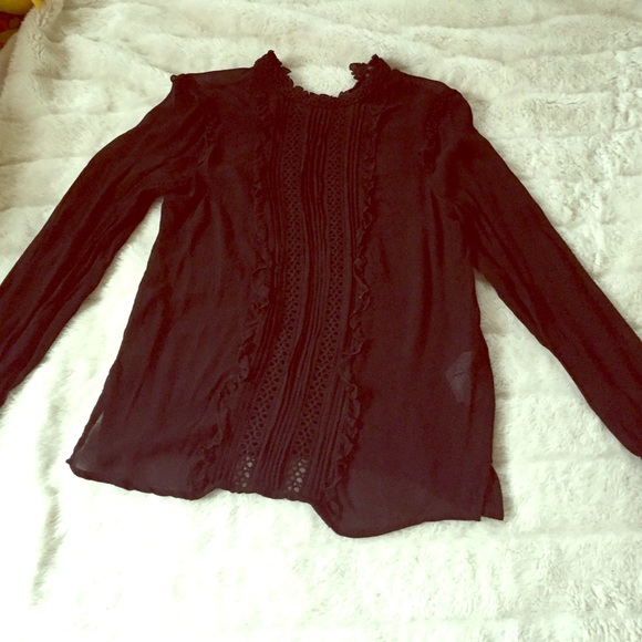 Sheer black long sleeved blouse from Forever 21's.