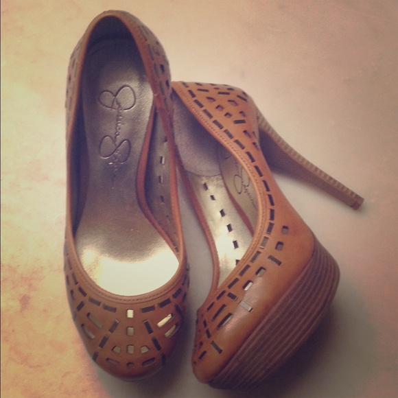 Camel colored heels with metal cutouts.