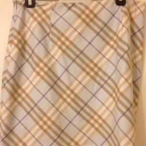 Burberry Women's classic plaid skirt.