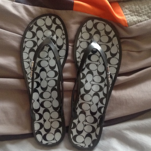 Black coach flip flops