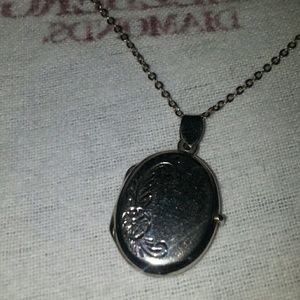 Sliver antique locket.