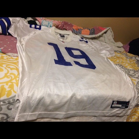 White and Blue Dallas Cowboys Miles Austin jersey.