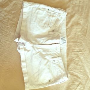 Billabong white jean shorts; M