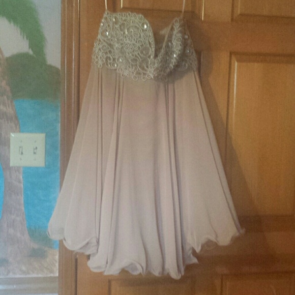 Nude strapless homecoming dress with corset back