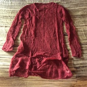Wool sweater with open stitching