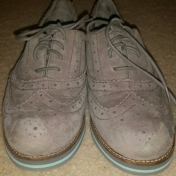Grey and teal loafer type shoes