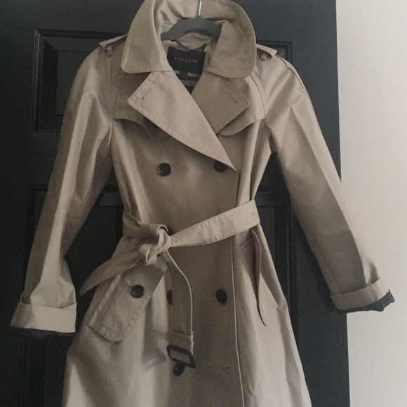 Authentic mid length Coach trench coat.