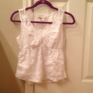 White sleeveless top