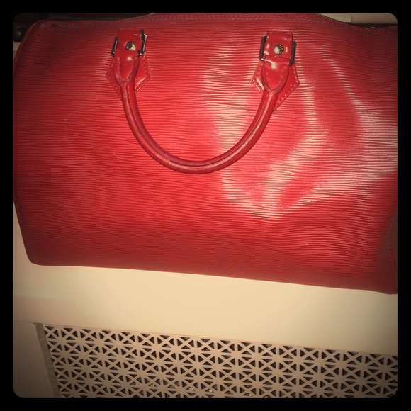 Classic authentic red Louis Vuitton epi speedy.