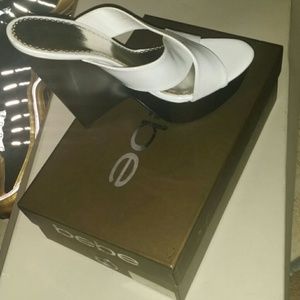 bebe black and white wedge like sandal