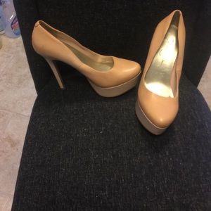 Beige leather pumps