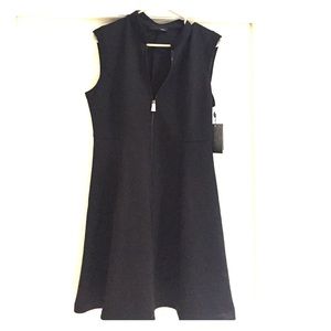Black dress with front zipper.