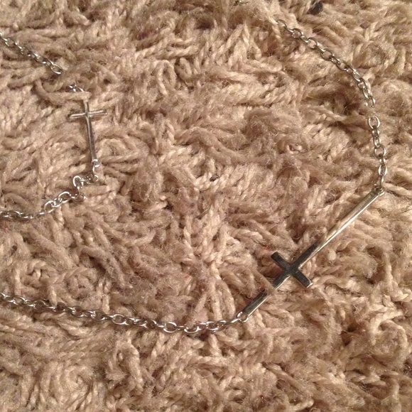 Separate multiple cross necklaces