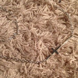 Separate multiple cross necklaces