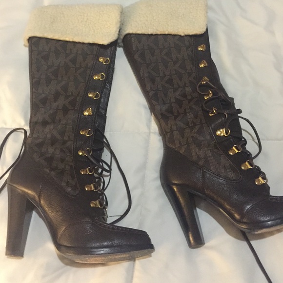 Michael Kors monogrammed boots