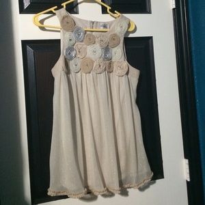 Sleeveless shirt, never been worn.