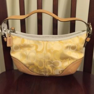 Small yellow coach handbag