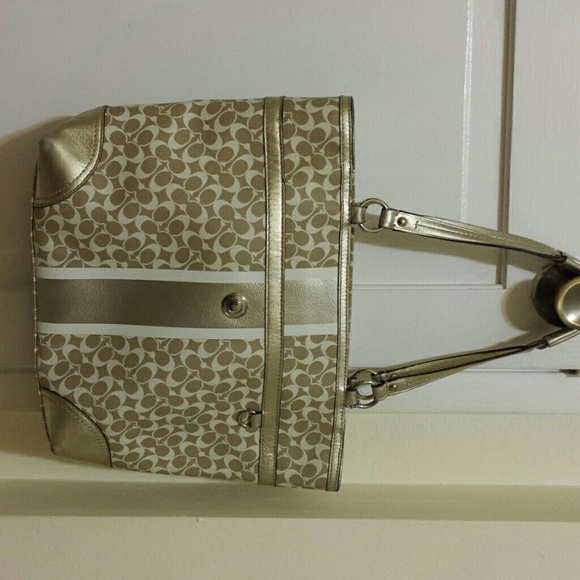 Gold coach purse