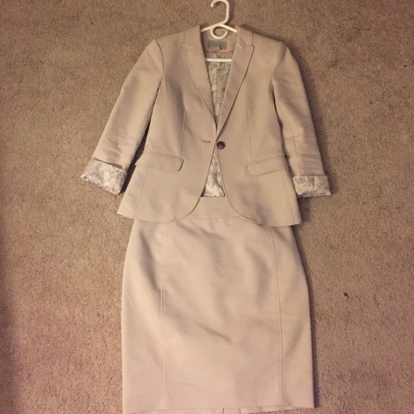 Very light gray business suit