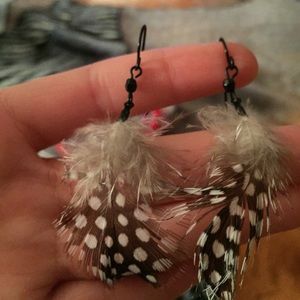 Two pairs of feather earrings
