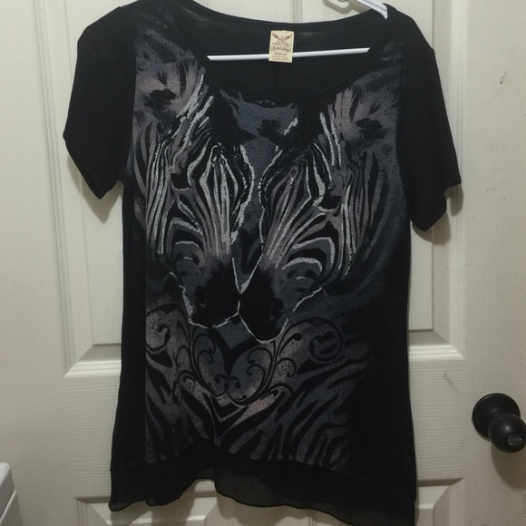 Zebra faces shirt.