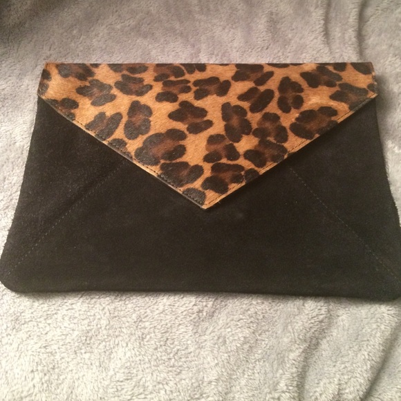 Wild black and animal print clutch