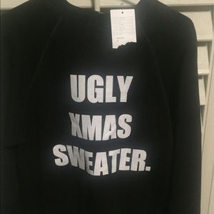 Black "ugly xmas sweater"