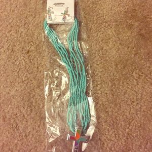 Turquoise cross necklace with matching earrings