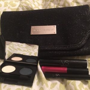 Victoria's Secret glitter clutch with makeup