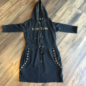 Black Bebe dress w/ studs & gold color Rhinestones