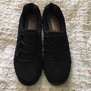 Black slip on walking shoes