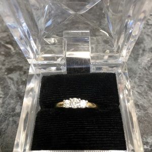 3 stone 14 Carat yellow gold with platinum