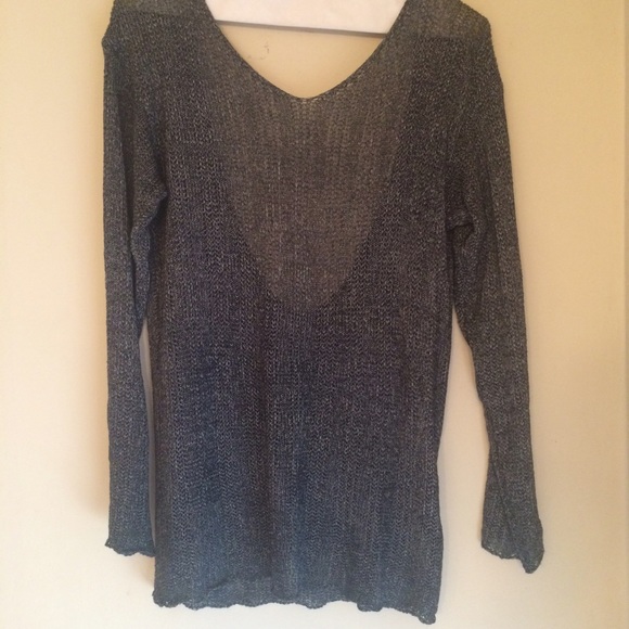 Gray long sleeve top.