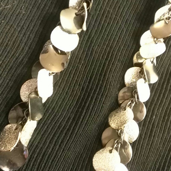 BLACK/SILVER FASHION EARINGS.