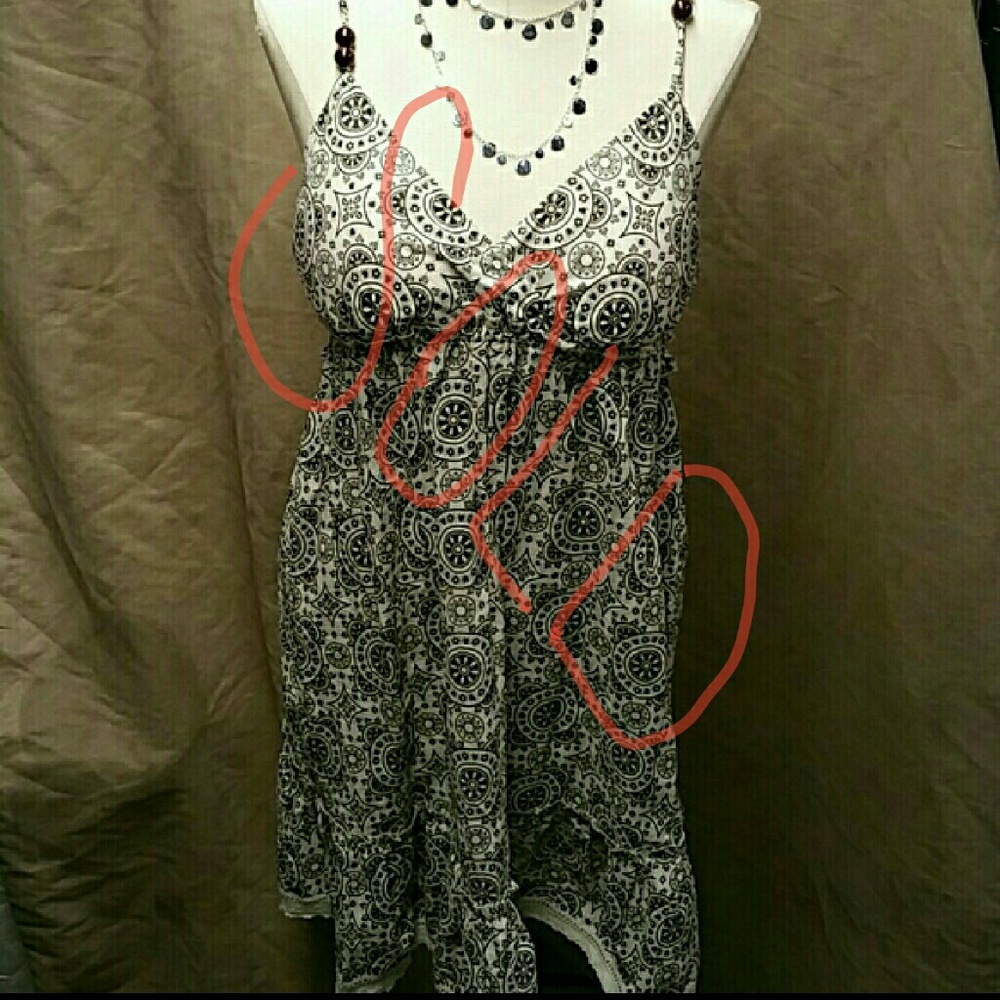 (NWOT) Cute dress with brown and white designs..