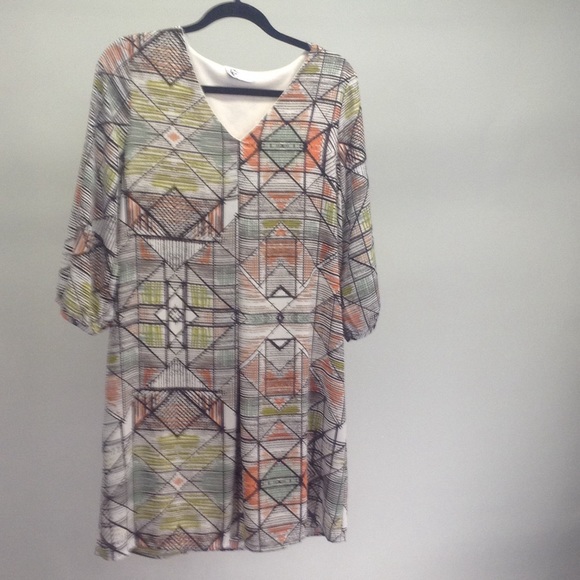 Geometric pleat front, a line dress