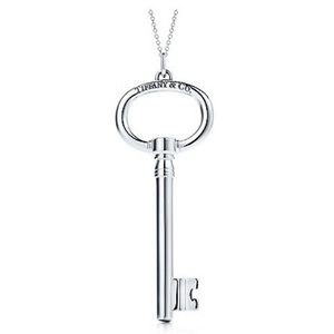Tiffany silver key pendant and chain.
