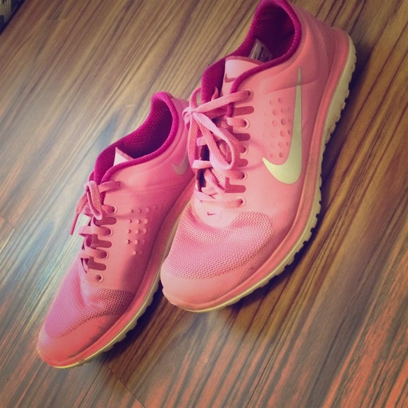 Pink Nike running shoes